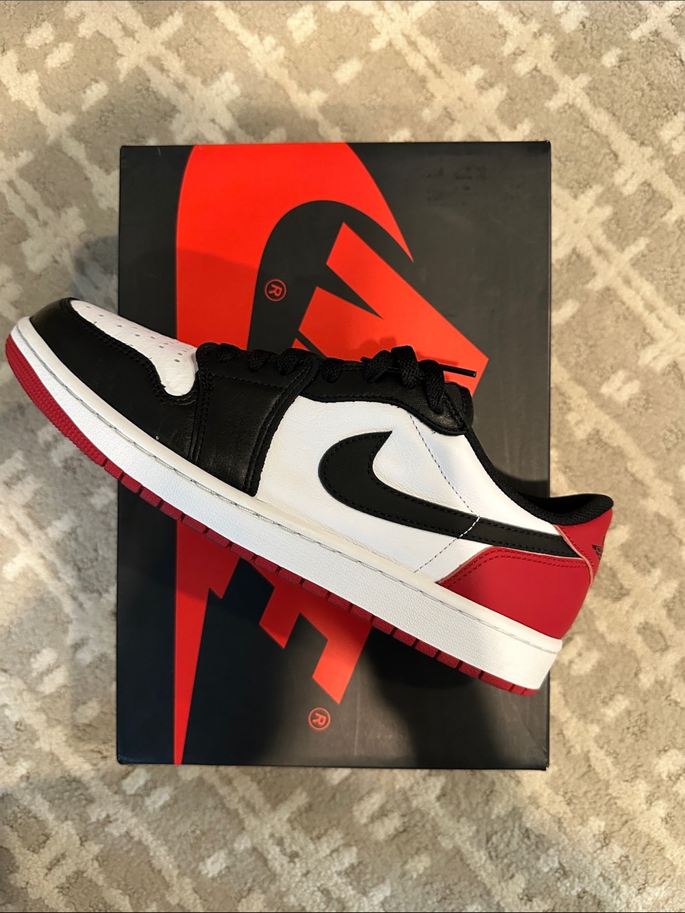 Nike Air Jordan 1 Low - White/Black/Red Men’s Sneaker. Blacktoe